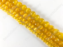 Load image into Gallery viewer, Faceted Round Cat&#39;s Eye Dyed Sunshine Yellow Beads Around 15&quot;
